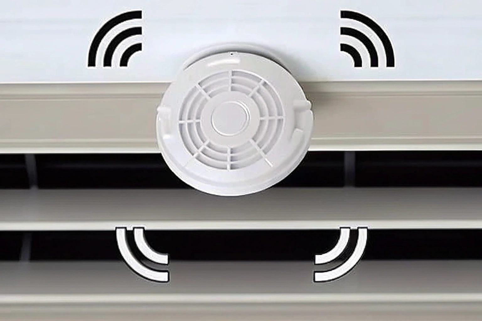 Un graphique minimaliste représentant un détecteur de fumée avec un symbole de caméra vidéo et des ondes sonores qui en émanent.