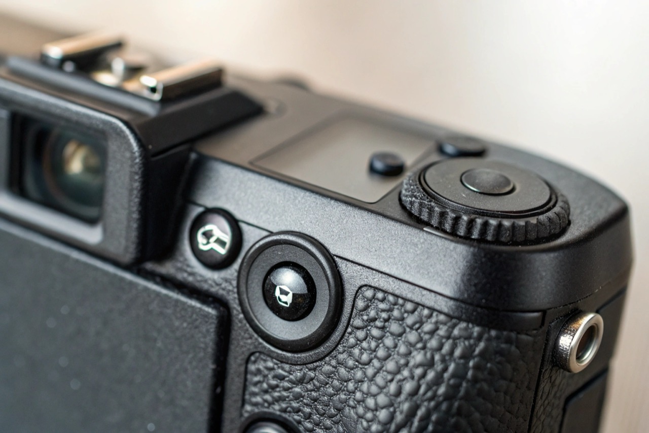 Close-up of a CE and ROHS certification mark printed on the back of a black spy camera